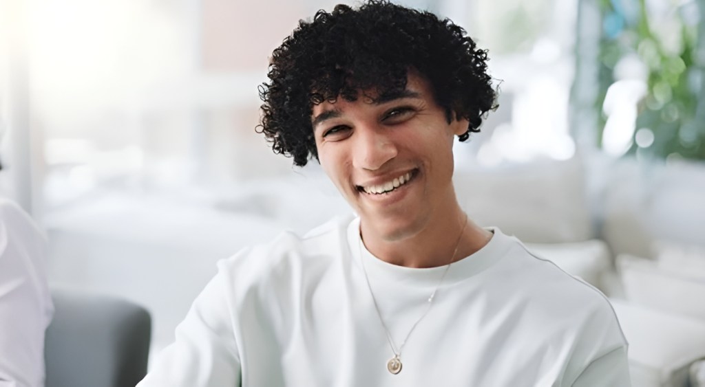 Young multi-racial smiling having been on a Make More training course